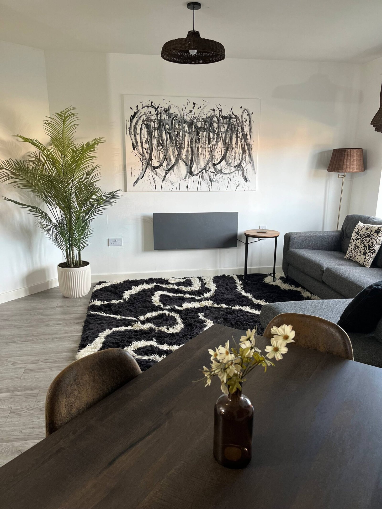 One bedroom Haydock apartment — open plan living room with corner sofa
